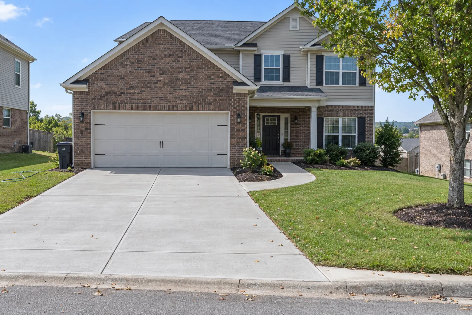 New concrete driveway and walkway at a home in Clarksville, TN